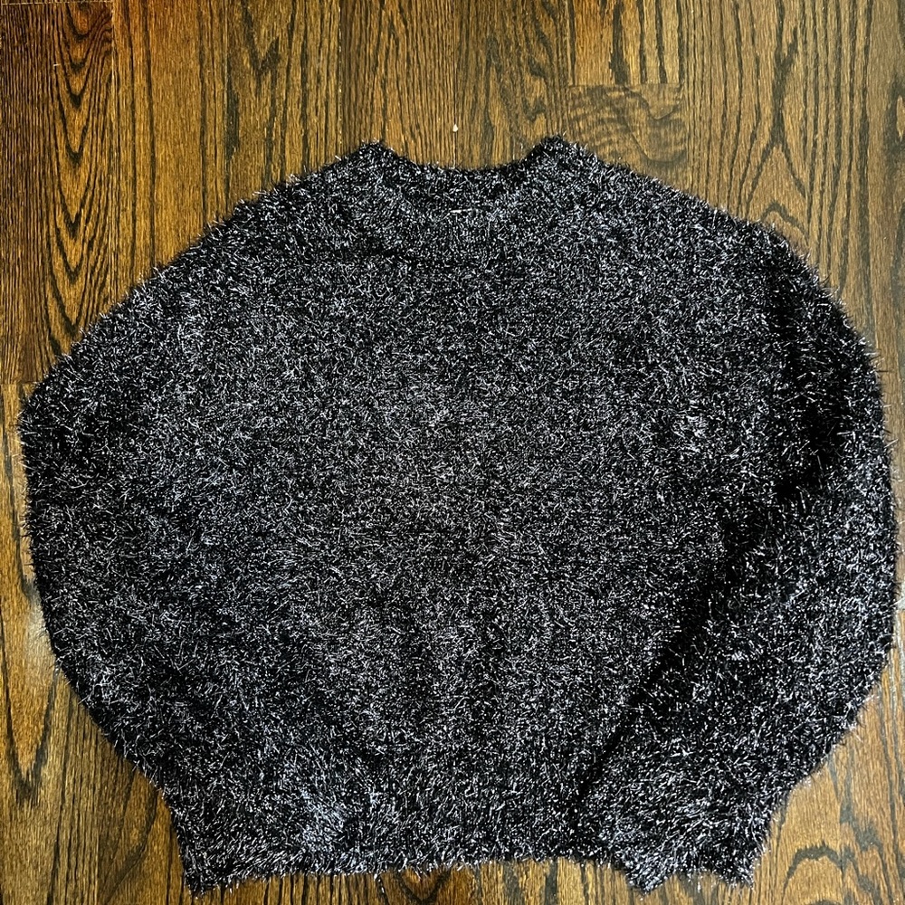H&M black w/ silver sweater. Used only once